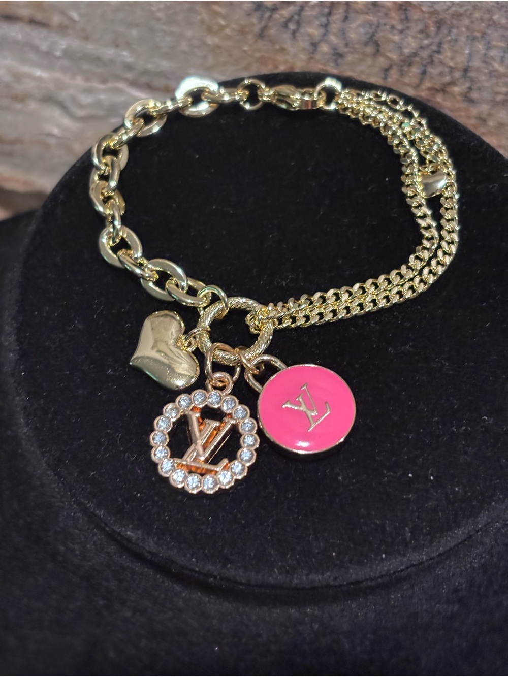 Gold-Tone Charm Bracelet with LV  Pink Enamel and Crystal Logo Charm